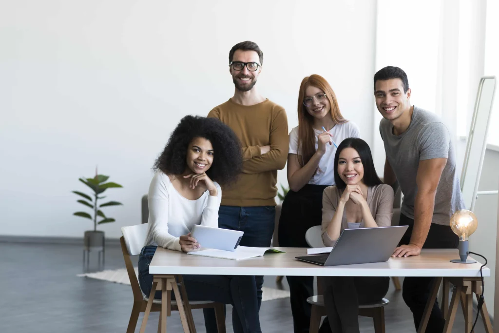 group-positive-young-people-posing-together-min